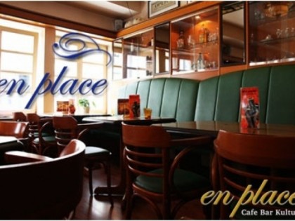 照片: en place